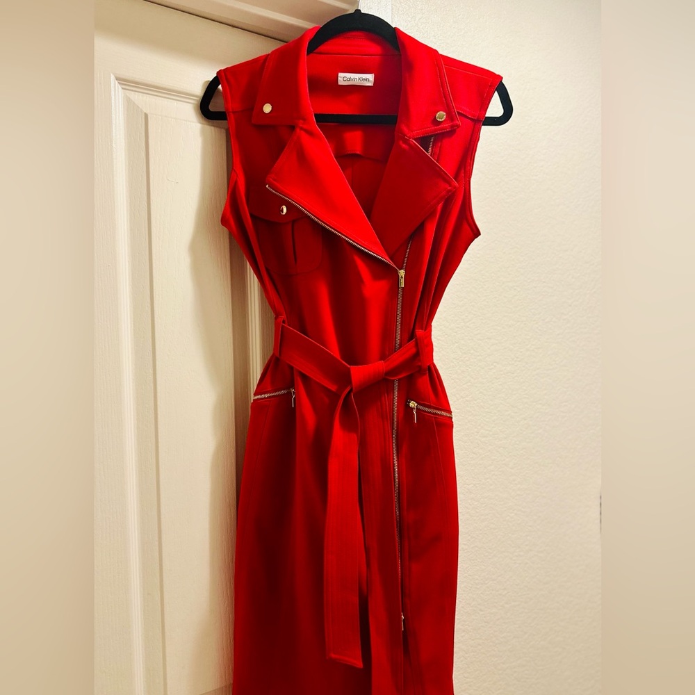 Calvin Klein red cocktail dress with gold zipper detail - tags still on.Size 8.